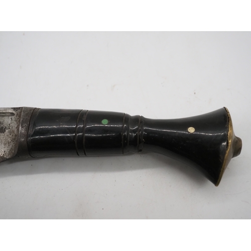 56 - Nepalese Ghurkha Knife. Polished black wooden handle with brass pommel and complete with leather sca... 