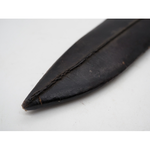 57 - Ghurkha Knife With a Bone Handle Grip. Complete with a leather scabbard with a single edged decorati... 