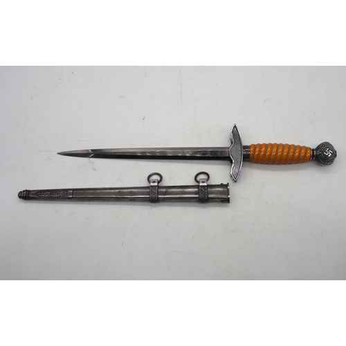 58 - WW2 German Luftwaffe 2nd Pattern Officer's Dress Dagger. With orange celluloid wire wrapped grip. Wi... 