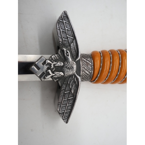 58 - WW2 German Luftwaffe 2nd Pattern Officer's Dress Dagger. With orange celluloid wire wrapped grip. Wi... 