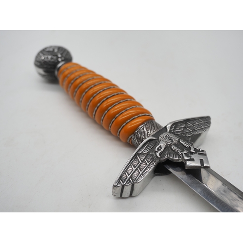 58 - WW2 German Luftwaffe 2nd Pattern Officer's Dress Dagger. With orange celluloid wire wrapped grip. Wi... 