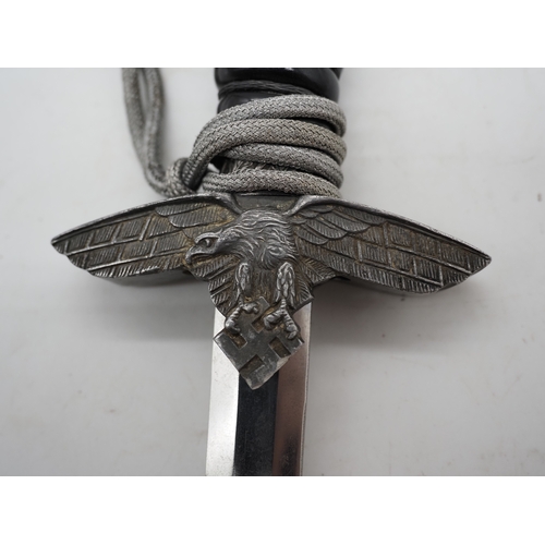 60 - WW2 German Luftwaffe Second Pattern Dress Dagger. Black celluloid grip with wire binding complete wi... 
