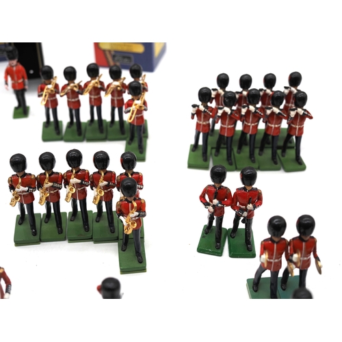 1 - Quantity of W. Britain toy soldier figures from the trooping of the colour collection. To include va... 