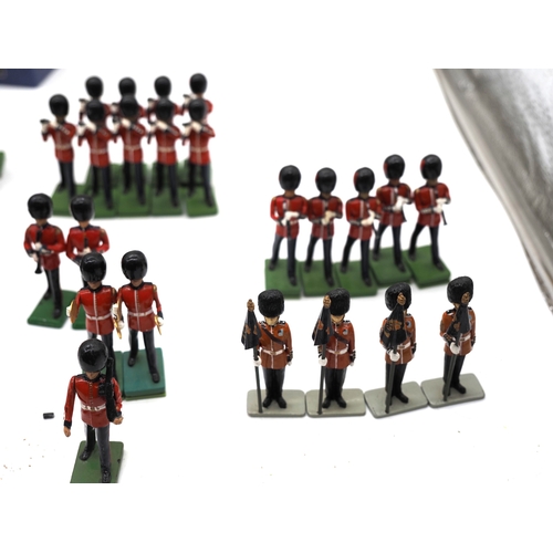 1 - Quantity of W. Britain toy soldier figures from the trooping of the colour collection. To include va... 