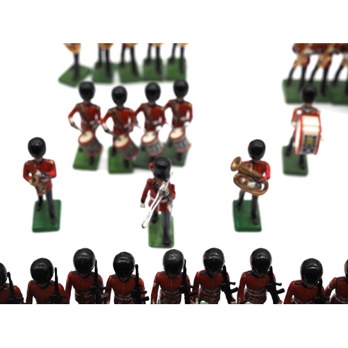 1 - Quantity of W. Britain toy soldier figures from the trooping of the colour collection. To include va... 
