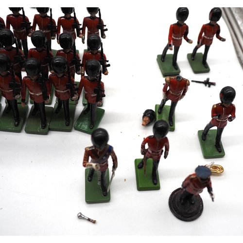 1 - Quantity of W. Britain toy soldier figures from the trooping of the colour collection. To include va... 