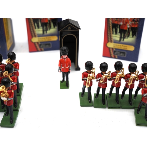 1 - Quantity of W. Britain toy soldier figures from the trooping of the colour collection. To include va... 