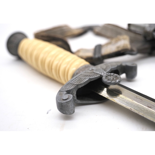 11 - WW2 German Army Officers Dagger. With hanging straps by Ernst Pack & Sohne Waffenfabrik. Late war pe... 