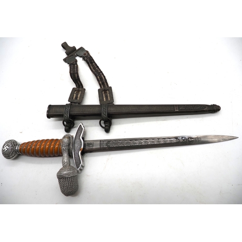 12 - WW2 German Luftwaffe 2nd Pattern Officers Dress Dagger. With scabbard, knot and hangers. Dagger has ... 