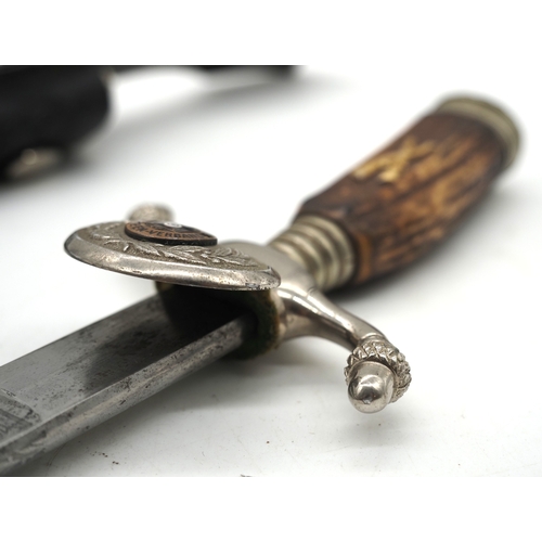 15 - Third Reich Shooting Association Dagger. With stag horn grip and brass crossed rifles inlaid. Nickel... 