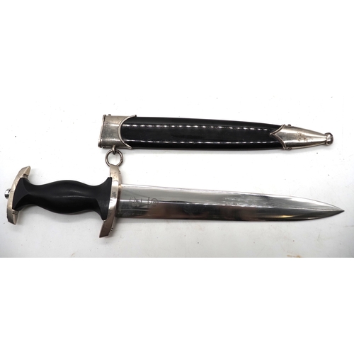 16 - Third Reich Transitional SS Dress Dagger. Ebony grip and aluminium eagle and enamel SS runes. Double... 