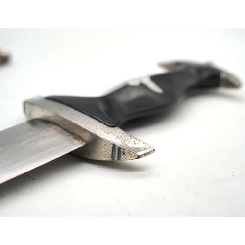 21 - Third Reich Transitional SS Dress Dagger.  Solingen. Ebony grip and aluminium eagle with enamel SS r... 
