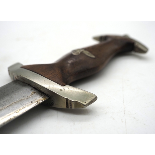 23 - Third Reich SA Dress Dagger. Dark wooden grip with eagle and enamel SA device inserted. Stamped 'WT'... 