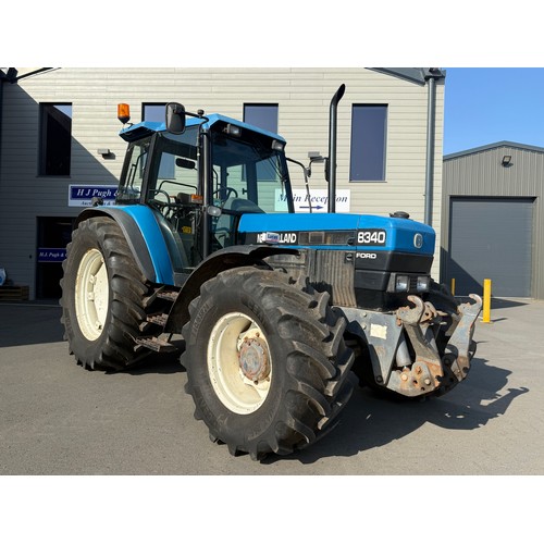 New Holland 8340 4WD tractor. Off farm tractor. Runs and drives well. 4 Spools and near new Farm Master tyres. Believed 13,000 hours. C/w front linkage. Reg. N695 WNT. Key in office