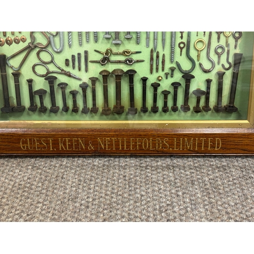 27A - Guest, Keen & Nettlefolds Limited screw and bolt display with glass front in oak case 27” x 22”