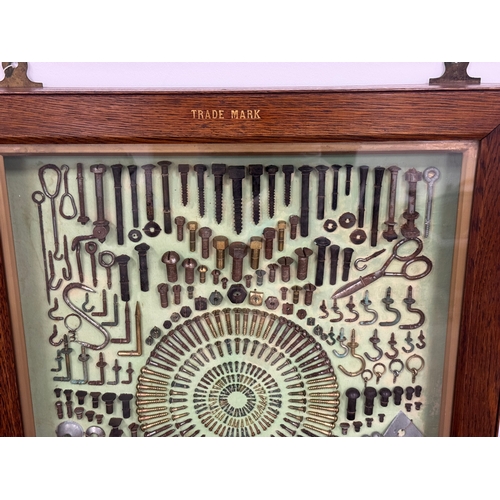 27A - Guest, Keen & Nettlefolds Limited screw and bolt display with glass front in oak case 27” x 22”