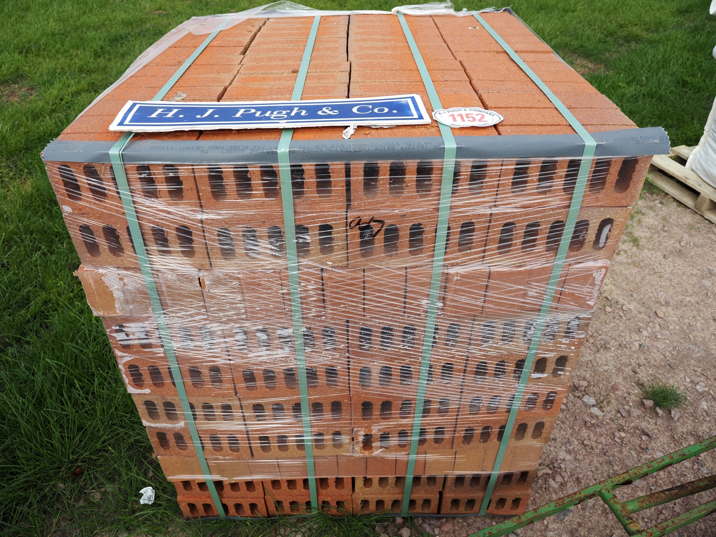 Pallet of red bricks
