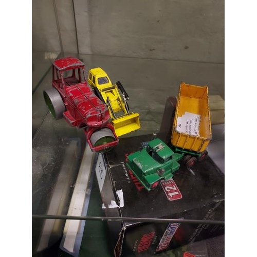 335 - 3 Diecast Vehicles Digger, Roller And Tipper Truck