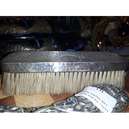 313 - Silver Plated Hand Mirror And A Silver Brush