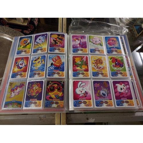 573 - Album Full Of Moshi Monster Trading Cards Lots Of Shiney Cards Mint