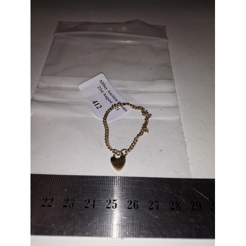 412 - 9Ct Gold Bracelet With Heart Locket Weight 2.8G