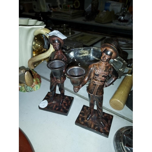 531 - 2 Metal Bell Boy Candlesticks