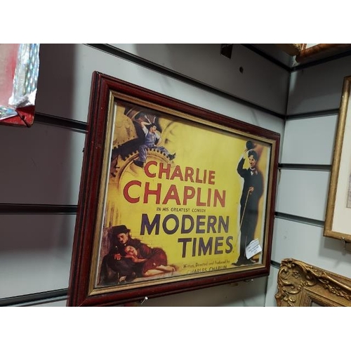 128 - Small Framed Charlie Chaplin Print