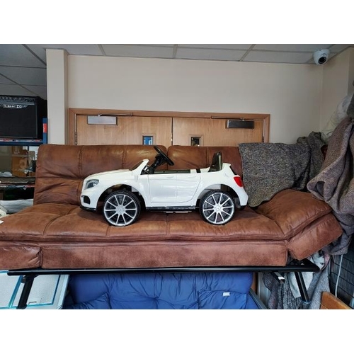 33 - Brown Leather Bed Settee