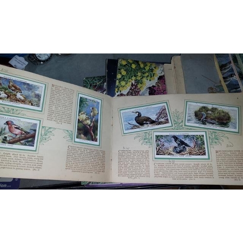 402 - Mixed Selection Of Books Containing Tea And Cigarette Cards