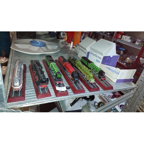 559 - 6 Model Trains On Wooden Plinths