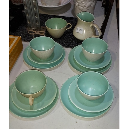 461 - 5 Poole Cups, 4 Saucers Plus Milk Jug. 1 Saucer Has Chip.