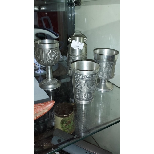 396 - 4 Items Of German Pewter Including Beaker, 2 Goblets And Churn