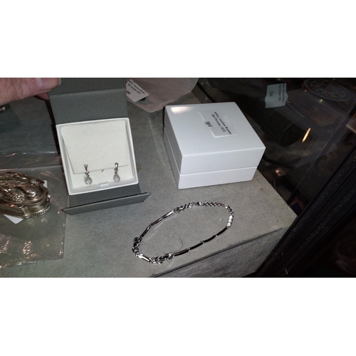 301 - Silver Bracelet And Earrings