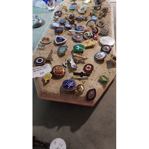 325 - Large Selection Of Badges On Padding