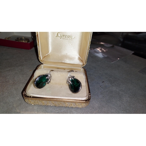 310 - Pair Of Emerald Colour Stone Dress Earrings