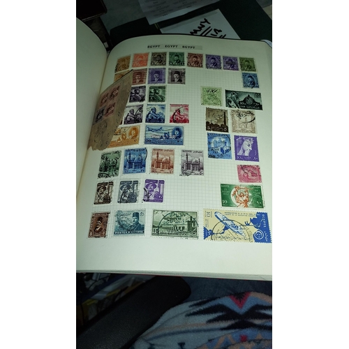 562 - Red Stamp Album Of World Stamps