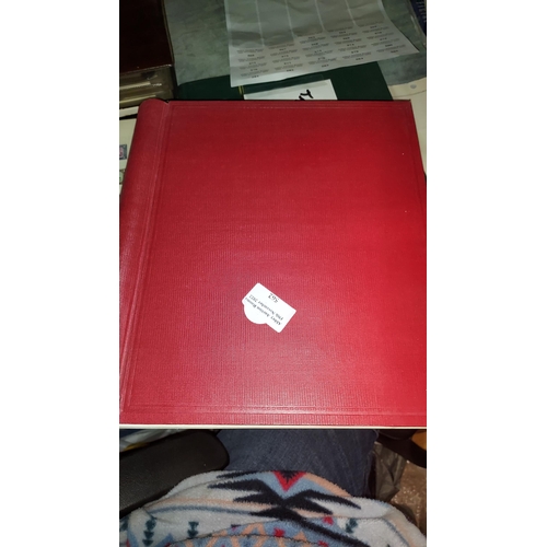 562 - Red Stamp Album Of World Stamps