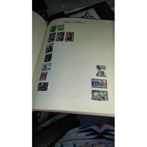 562 - Red Stamp Album Of World Stamps