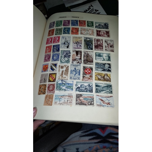 562 - Red Stamp Album Of World Stamps