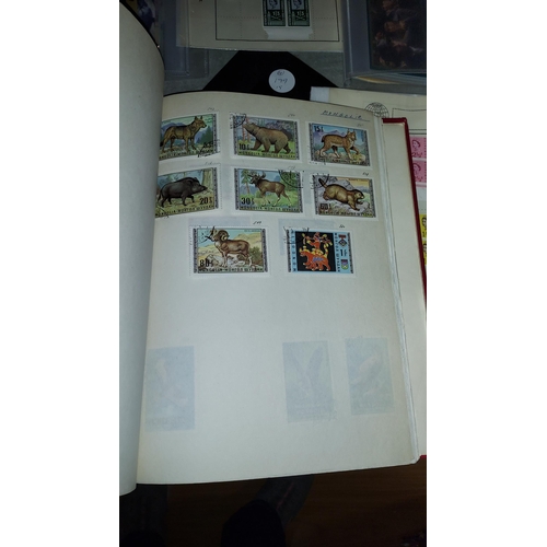 561 - Red Stamp Album With Stamps