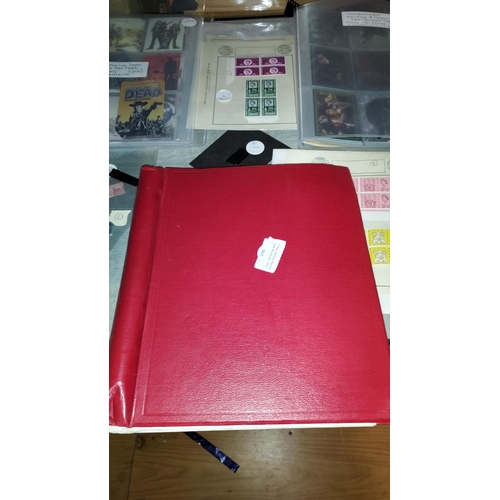 561 - Red Stamp Album With Stamps