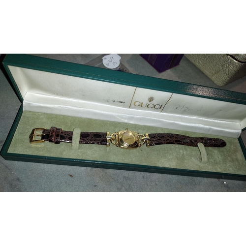 344 - Gucci Ladies Watch 6300L Working In Original Case, Gold Plated With Leather Strap, Some Ware To Gold... 