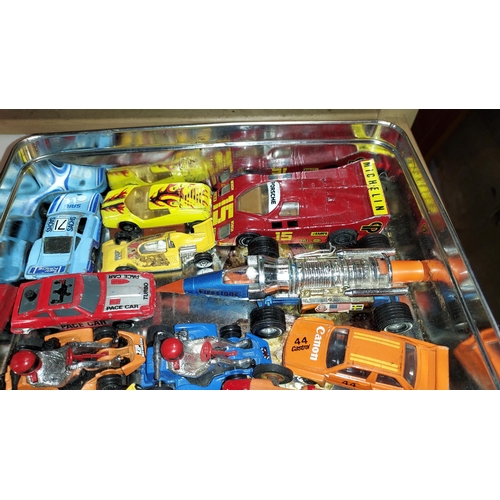 223 - Tin Of Diecast Racing Cars Including Corgi Star Fighter Jet Dragster 1974-77 No.169  And Matchbox