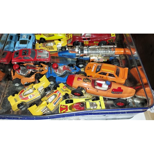 223 - Tin Of Diecast Racing Cars Including Corgi Star Fighter Jet Dragster 1974-77 No.169  And Matchbox