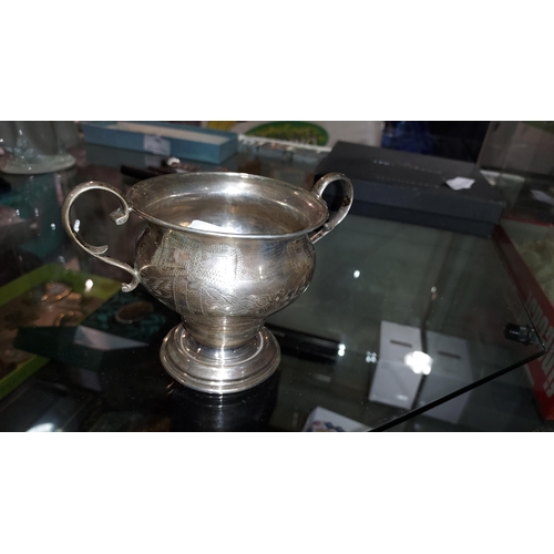 305 - Silver Decorative 2 Handled Cup. 142.2 Grams