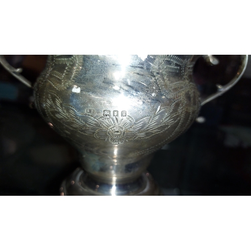 305 - Silver Decorative 2 Handled Cup. 142.2 Grams