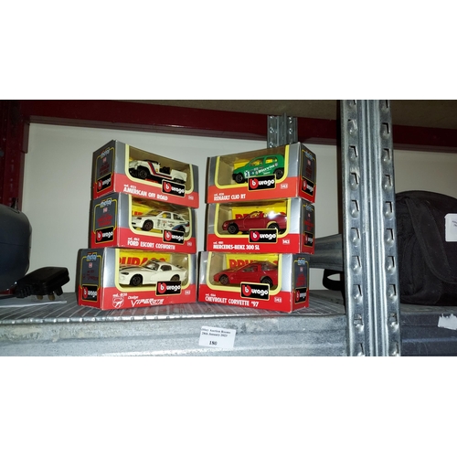 180 - 6 Boxed Burago Diecast Cars