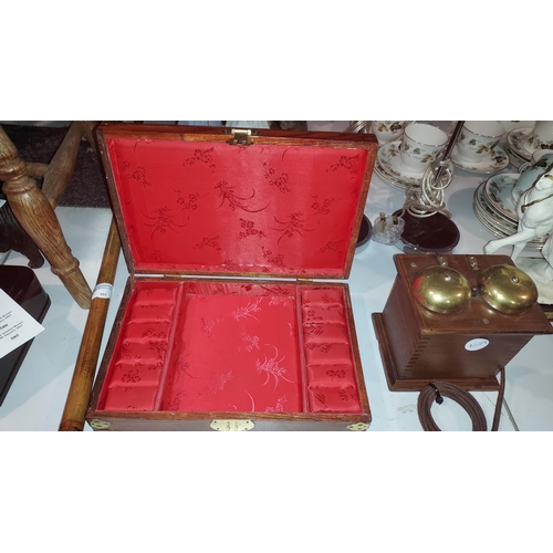 557 - Wooden Oriental Style Jewellery Box With Brass Corners. Possible Jade To Centre