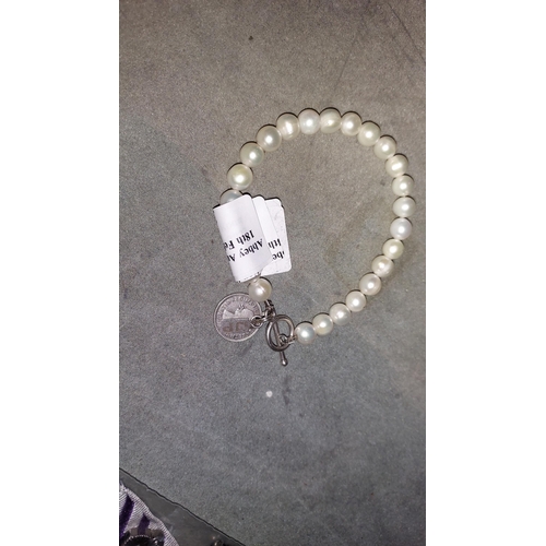 362 - Simulated Pearl Bracelet With Silver Clasp And 1956 Australian Coin