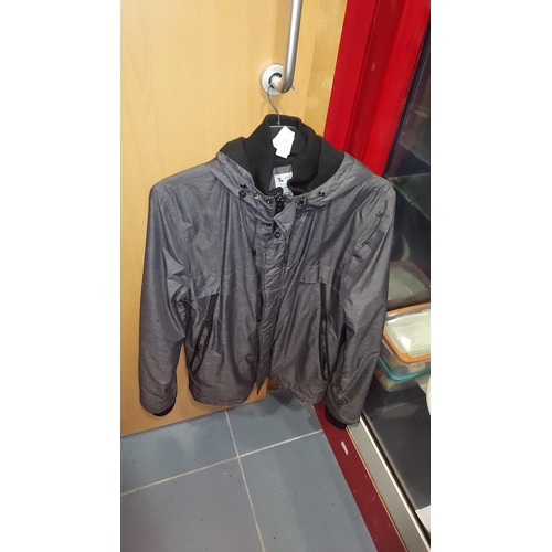 14 - Tu Rain Coat, Size Small. Hole In Pocket